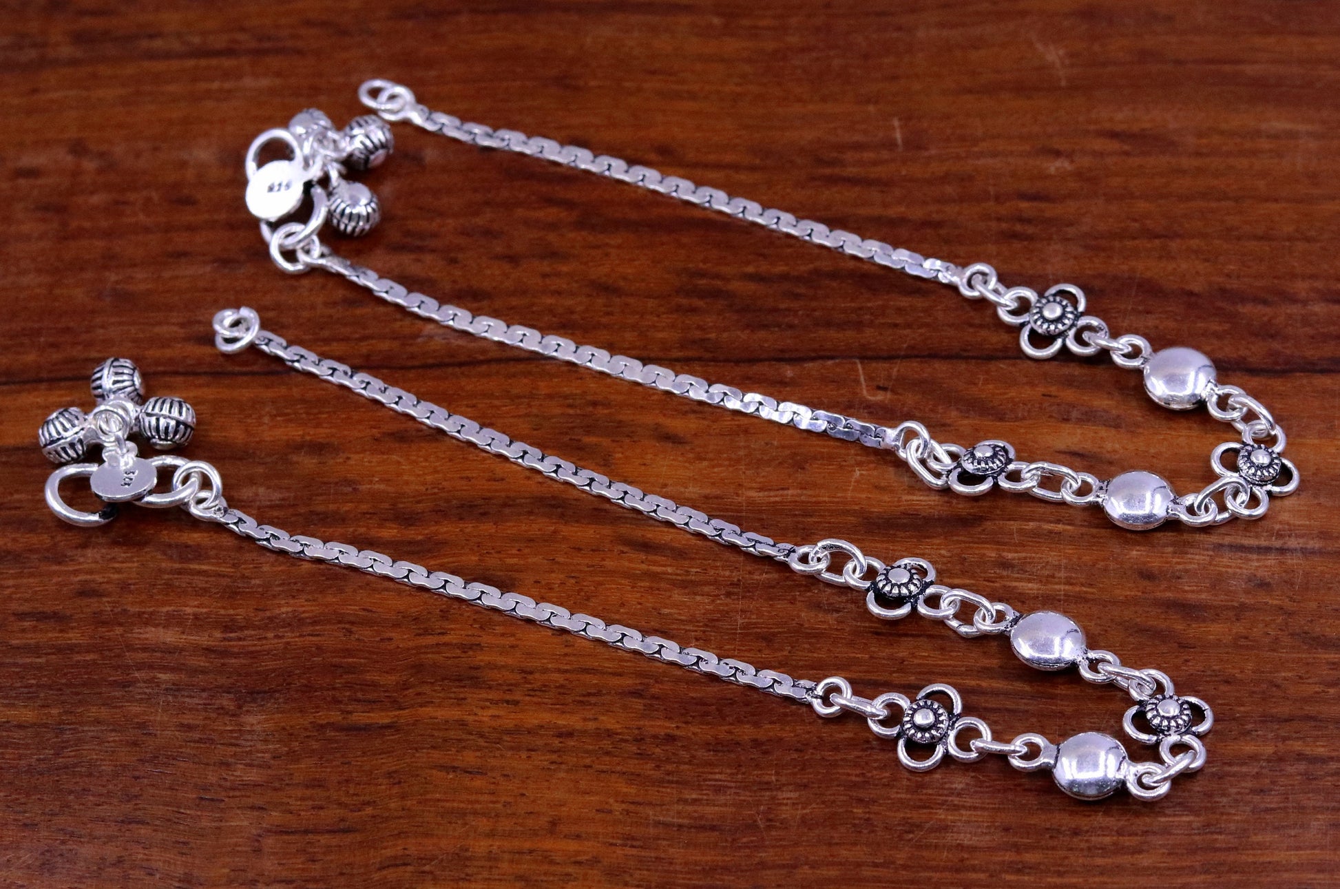 Sterling silver handmade charm anklet, 10.5 inches long, featuring tribal designs, perfect as foot jewelry or bridesmaids gift.