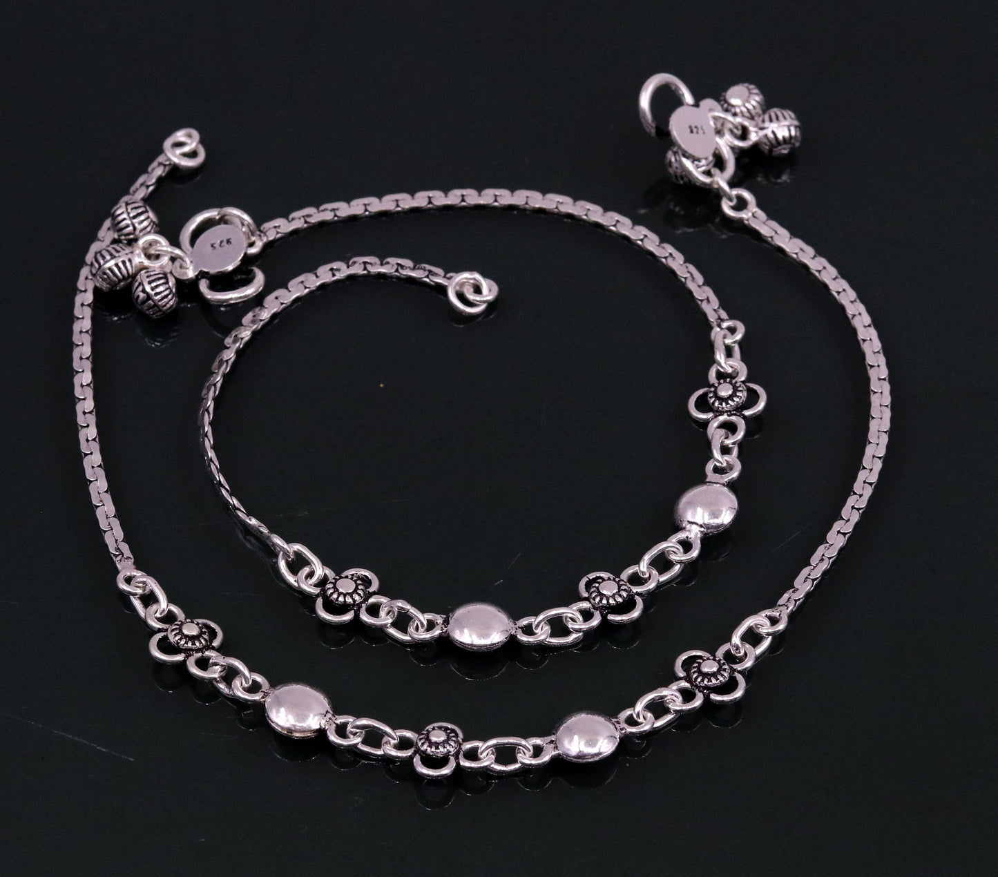 Sterling silver handmade charm anklet, 10.5 inches long, featuring intricate designs, perfect for foot jewelry, dance, or bridesmaids gifts.