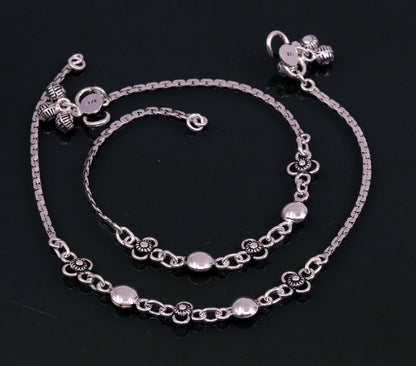 Sterling silver handmade charm anklet, 10.5 inches long, featuring intricate designs, perfect for foot jewelry, dance, or bridesmaids gifts.