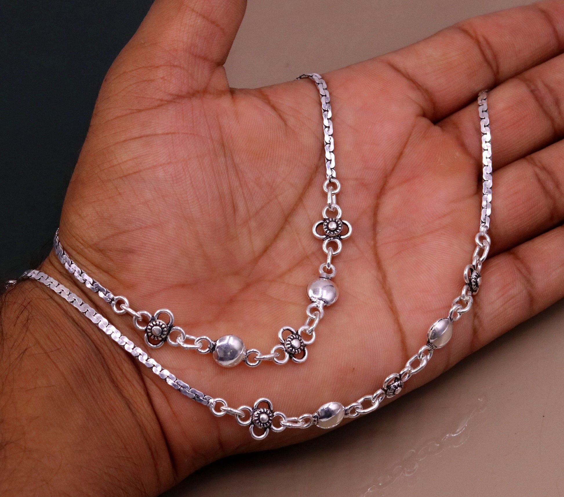 Handmade 925 silver charm anklet from TRIBAL ORNAMENTS, 10.5-inch foot bracelet with intricate tribal designs, perfect for dance and gifting.
