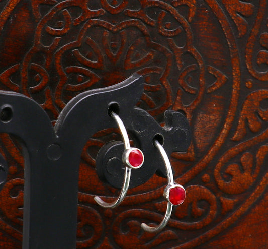 Sterling silver handmade single ruby stud earring from Tribal Ornaments, stylish jewelry perfect for brides and special occasions.