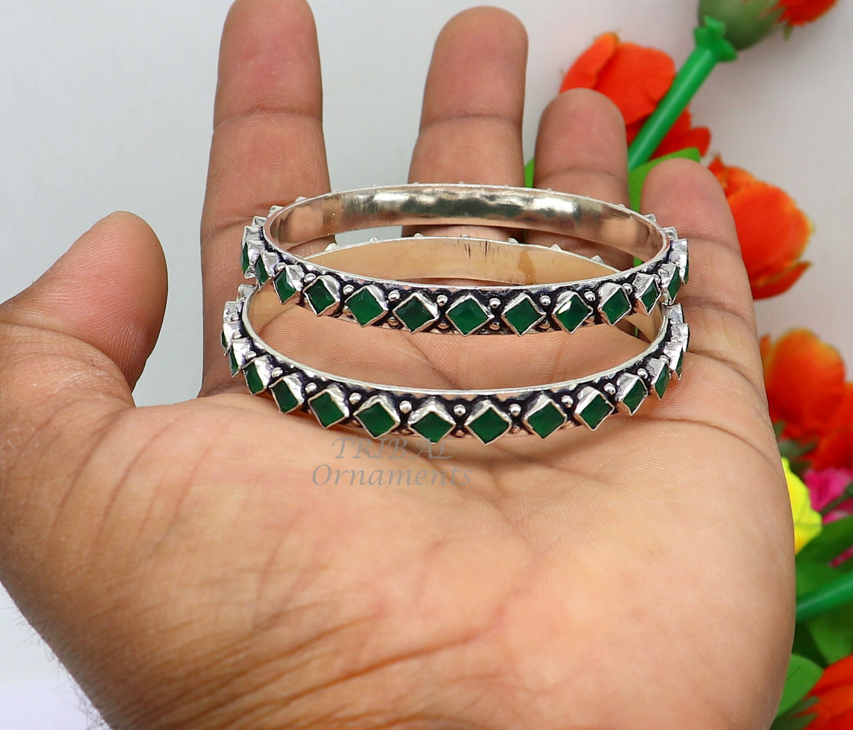Handmade 925 sterling silver tribal bangle bracelet with green stone, featuring fashionable ethnic design for women.