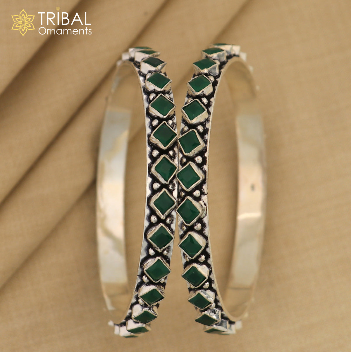 Handmade 925 sterling silver tribal bangle bracelet with green stone, featuring fashionable ethnic design for women.