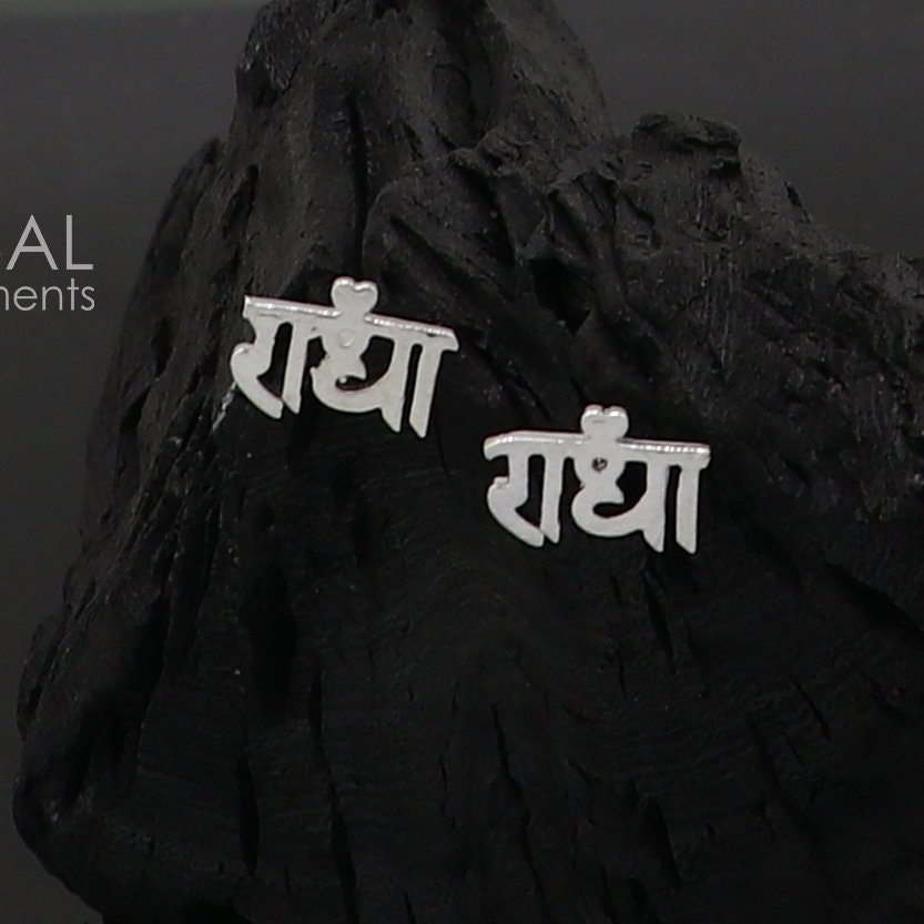 Sterling silver handmade Radha goddess stud earring, unisex cultural divine jewelry, detailed silver craftsmanship.