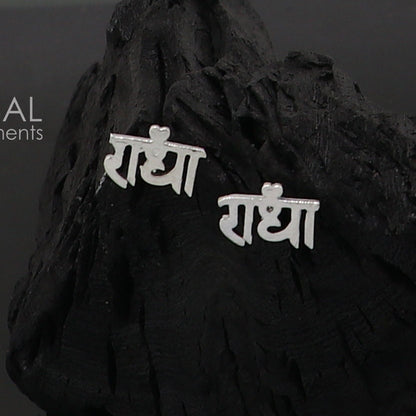 Sterling silver handmade Radha goddess stud earring, unisex cultural divine jewelry, detailed silver craftsmanship.