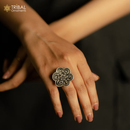 Sterling silver handmade flower-shaped adjustable ring by TRIBAL ORNAMENTS, featuring tribal ethnic design and unisex style.