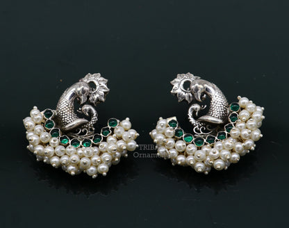 Sterling silver peacock design stud earring with cut stone and pearl, handcrafted tribal jewelry by TRIBAL ORNAMENTS.