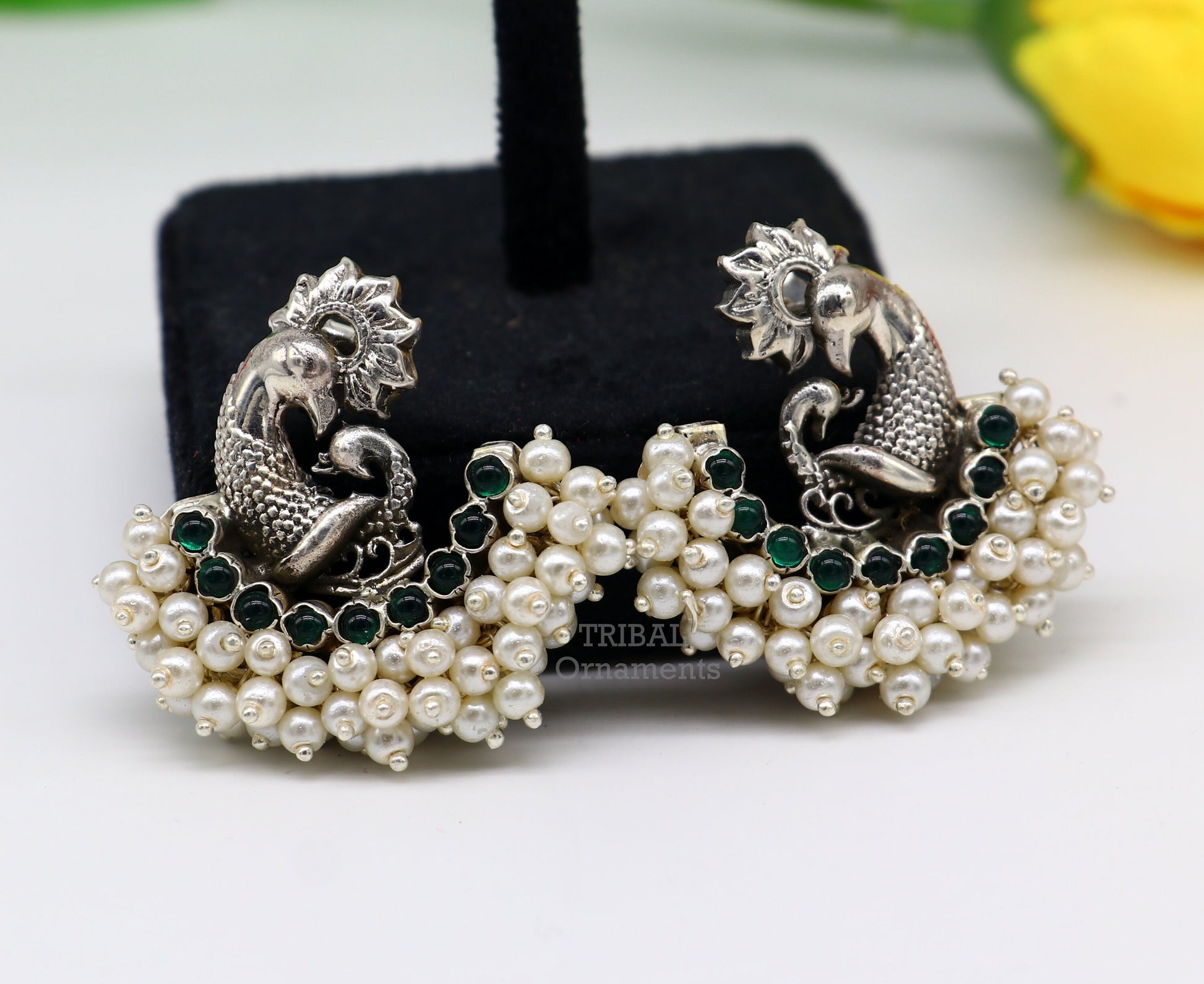 Sterling silver peacock design stud earring with cut stone and pearl, handmade tribal jewelry by TRIBAL ORNAMENTS.