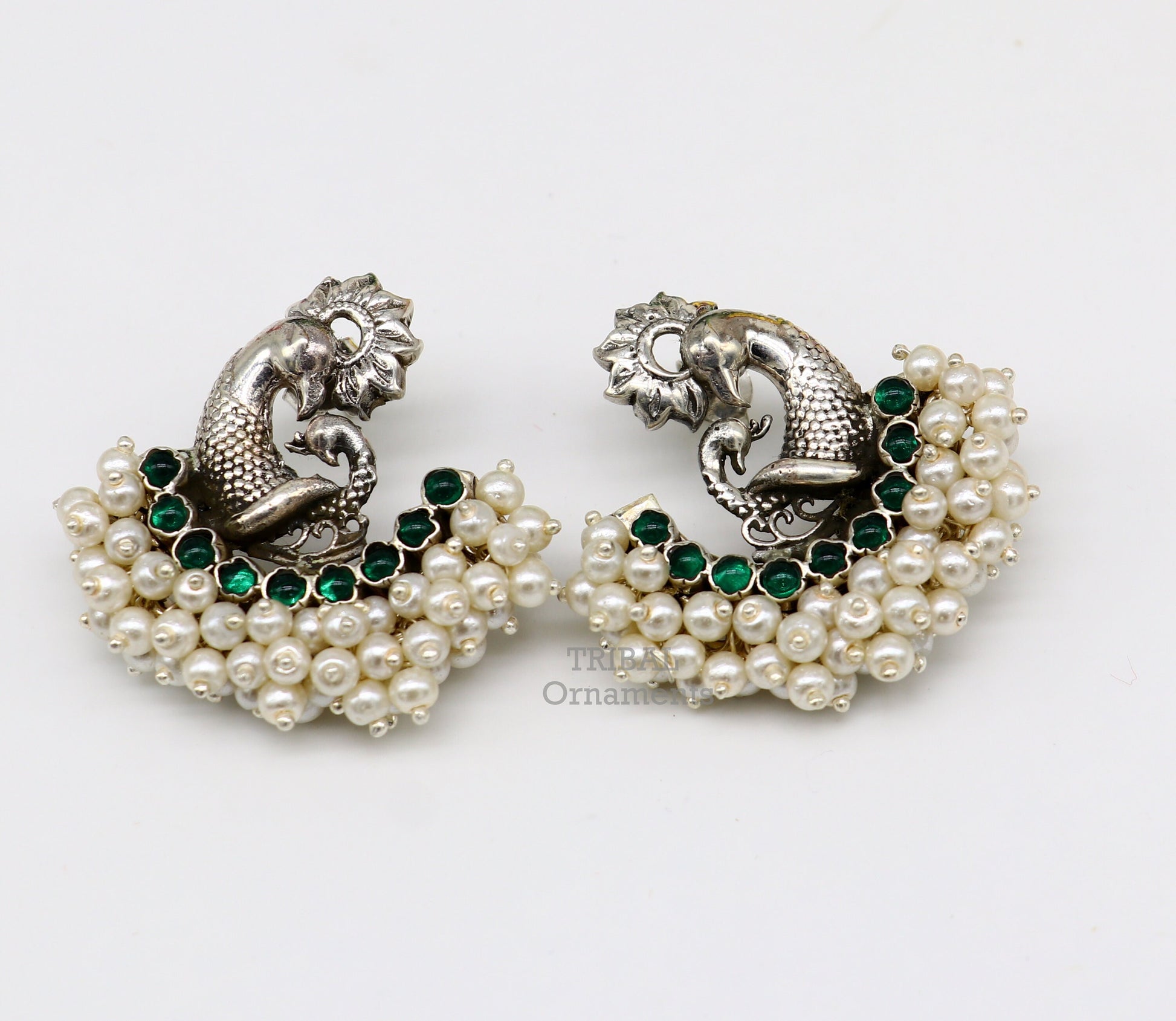 Sterling silver peacock design stud earring with cut stone and pearl, handmade tribal jewelry by TRIBAL ORNAMENTS.