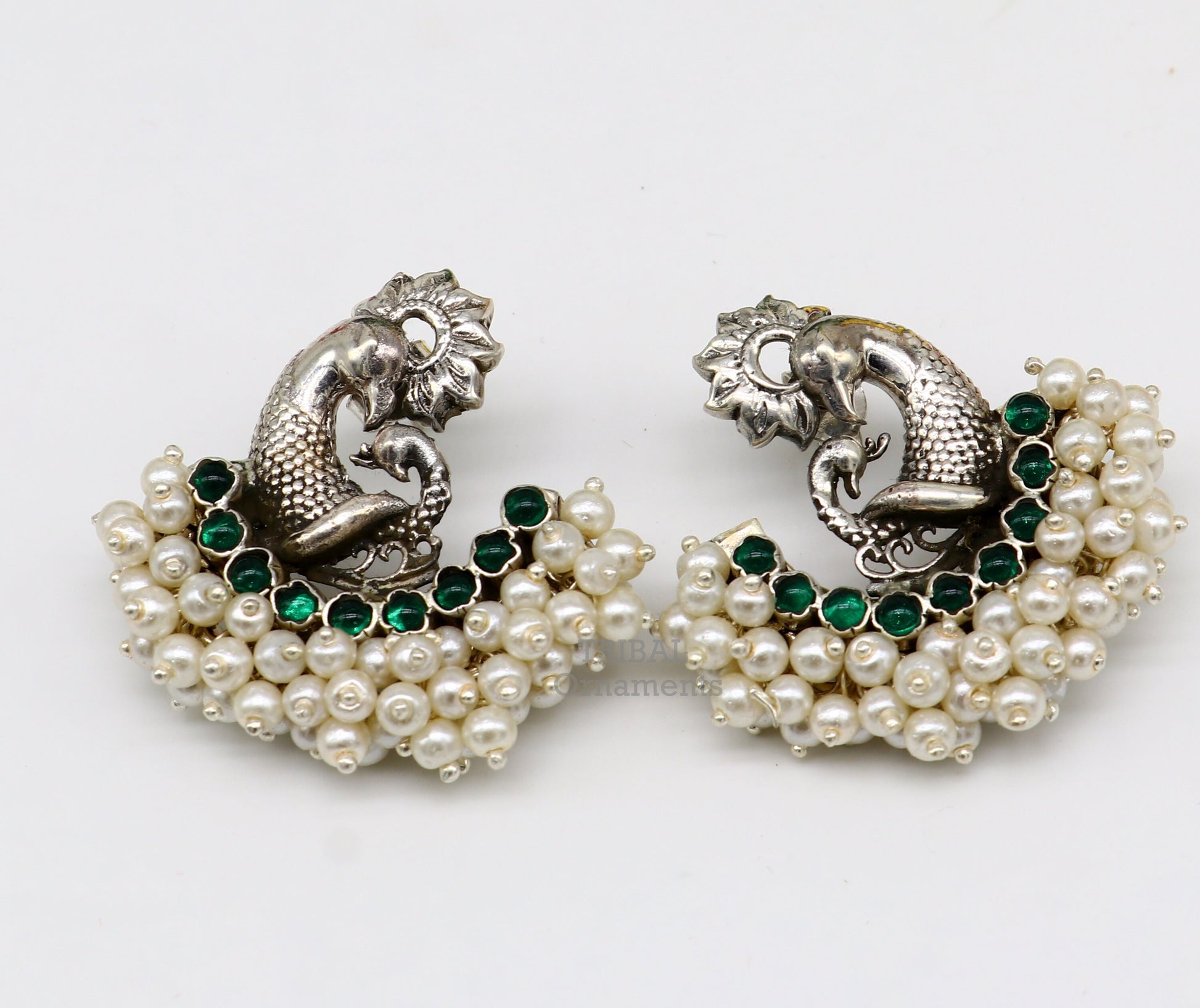 Sterling silver peacock design stud earring with cut stone and pearl, handmade tribal jewelry by TRIBAL ORNAMENTS.