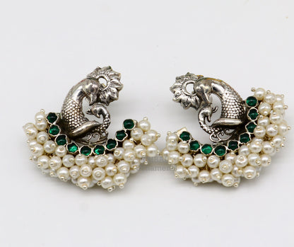 Sterling silver peacock design stud earring with cut stone and pearl, handmade tribal jewelry by TRIBAL ORNAMENTS.
