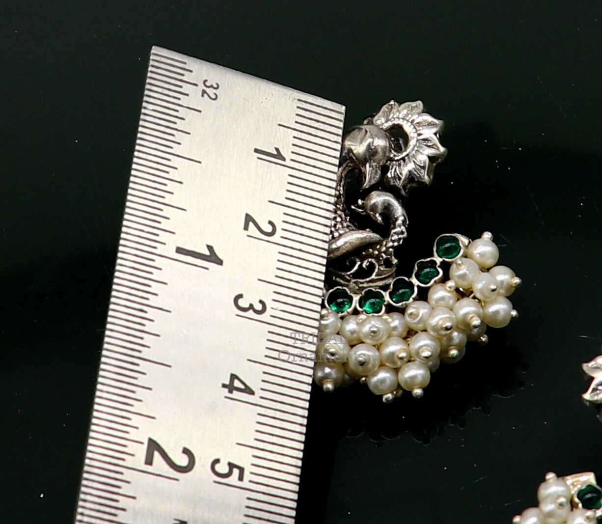 Sterling silver peacock design stud earring with cut stone and pearl, handmade tribal jewelry by TRIBAL ORNAMENTS.