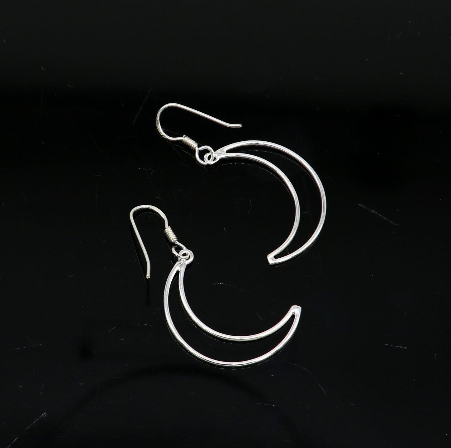 Sterling silver handmade half-moon arc hoop earring with geometric drop design, elegant and trendy for stylish women.
