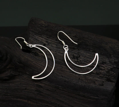 Sterling silver half moon arc hoop earring with drop dangle design, handmade tribal jewelry for stylish, elegant looks.