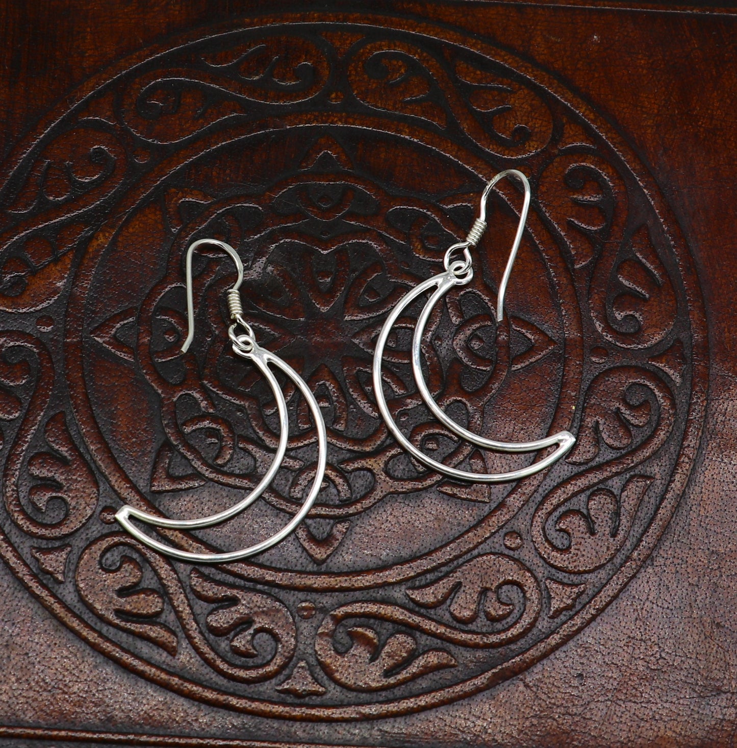 Sterling silver half moon arc hoop earring by TRIBAL ORNAMENTS, elegant geometric drop earring with plain, trendy design.