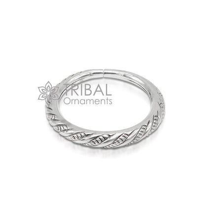 Unisex 925 sterling silver heavy bangle bracelet with intricate tribal design, handmade tribal ornaments jewelry.