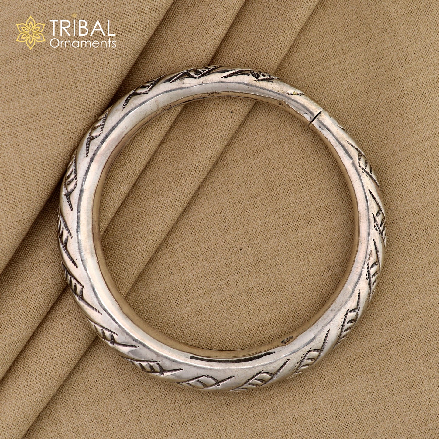 Unisex 925 sterling silver handmade heavy bangle bracelet with intricate tribal ornament design, stylish and durable jewelry piece.