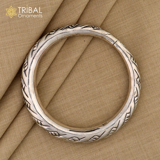 Unisex 925 sterling silver handmade heavy bangle bracelet with intricate tribal ornament design, stylish and durable jewelry piece.
