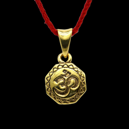 Sterling silver Hindu mantra 'Aum' OM pendant with gold polish, stylish good luck jewelry from TRIBAL ORNAMENTS.