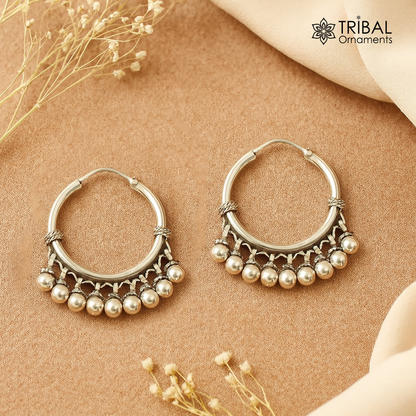 Elegant 925 sterling silver handmade hoop earring with hanging bells and hook, showcasing tribal design and intricate craftsmanship.