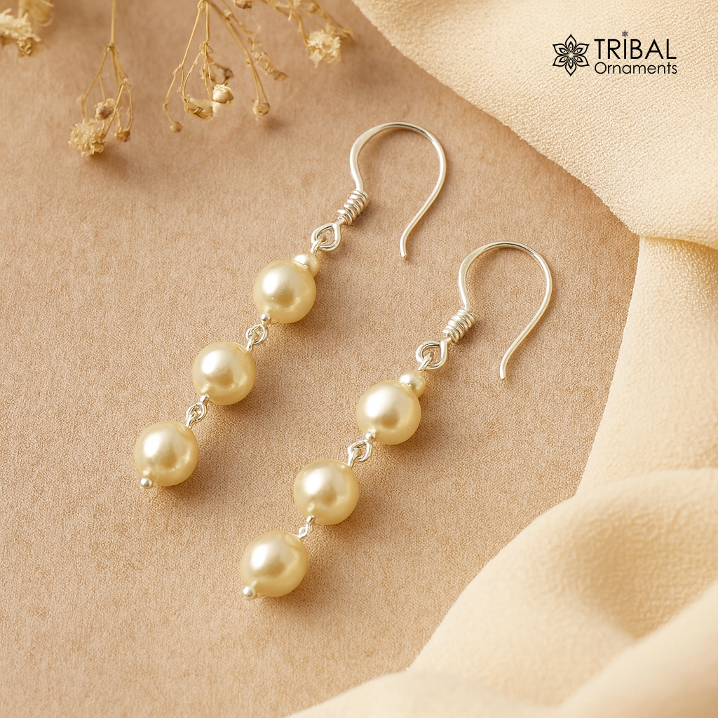 Sterling silver handmade hoops with dangling pearls, stylish drop earrings for bridesmaids and special occasions.