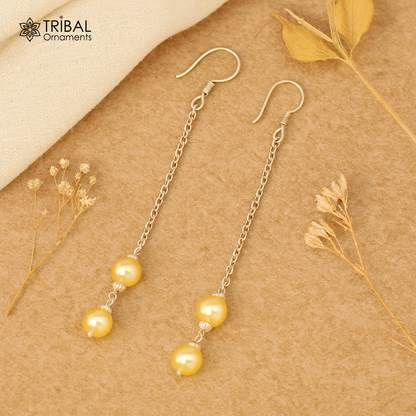 Sterling silver handmade hoop earrings with dangling pearls, perfect for bridesmaids and special occasions.