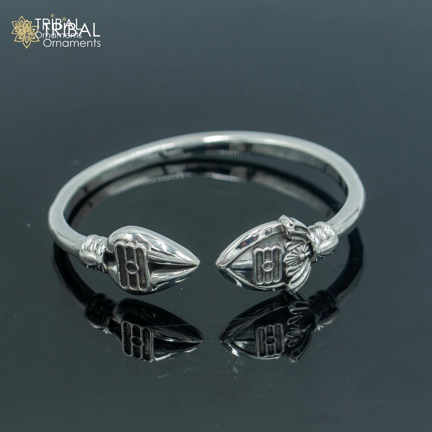 925 sterling silver Lord Karthikeya design bangle cuff by TRIBAL ORNAMENTS, adjustable unisex jewelry with intricate deity motif.