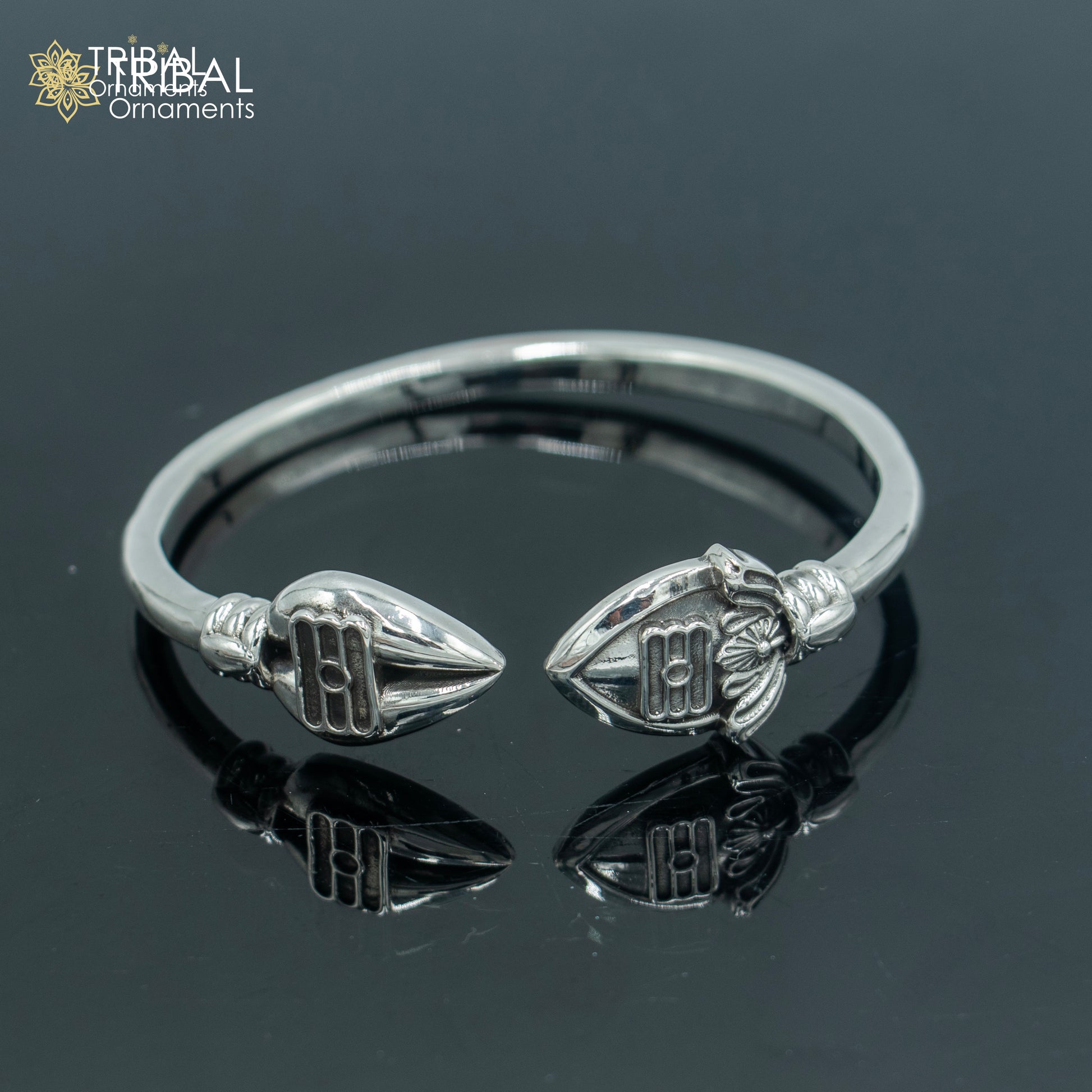 925 sterling silver Lord Karthikeya design bangle cuff by TRIBAL ORNAMENTS, adjustable unisex jewelry with intricate deity motif.