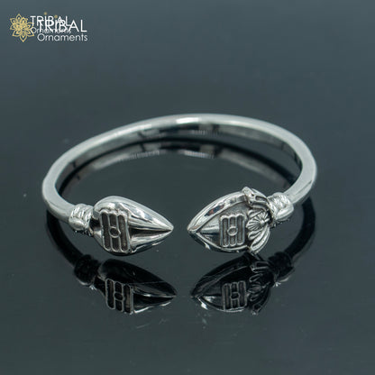 925 sterling silver Lord Karthikeya design bangle cuff by TRIBAL ORNAMENTS, adjustable unisex jewelry with intricate deity motif.