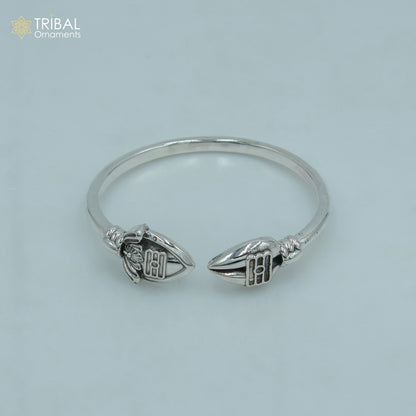 Sterling silver Lord Karthikeya design bangle cuff bracelet by Tribal Ornaments, adjustable unisex jewelry with intricate craftsmanship.
