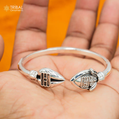 925 sterling silver Lord Karthikeya design bangle cuff from TRIBAL ORNAMENTS, adjustable unisex jewelry bracelet with intricate handmade details.