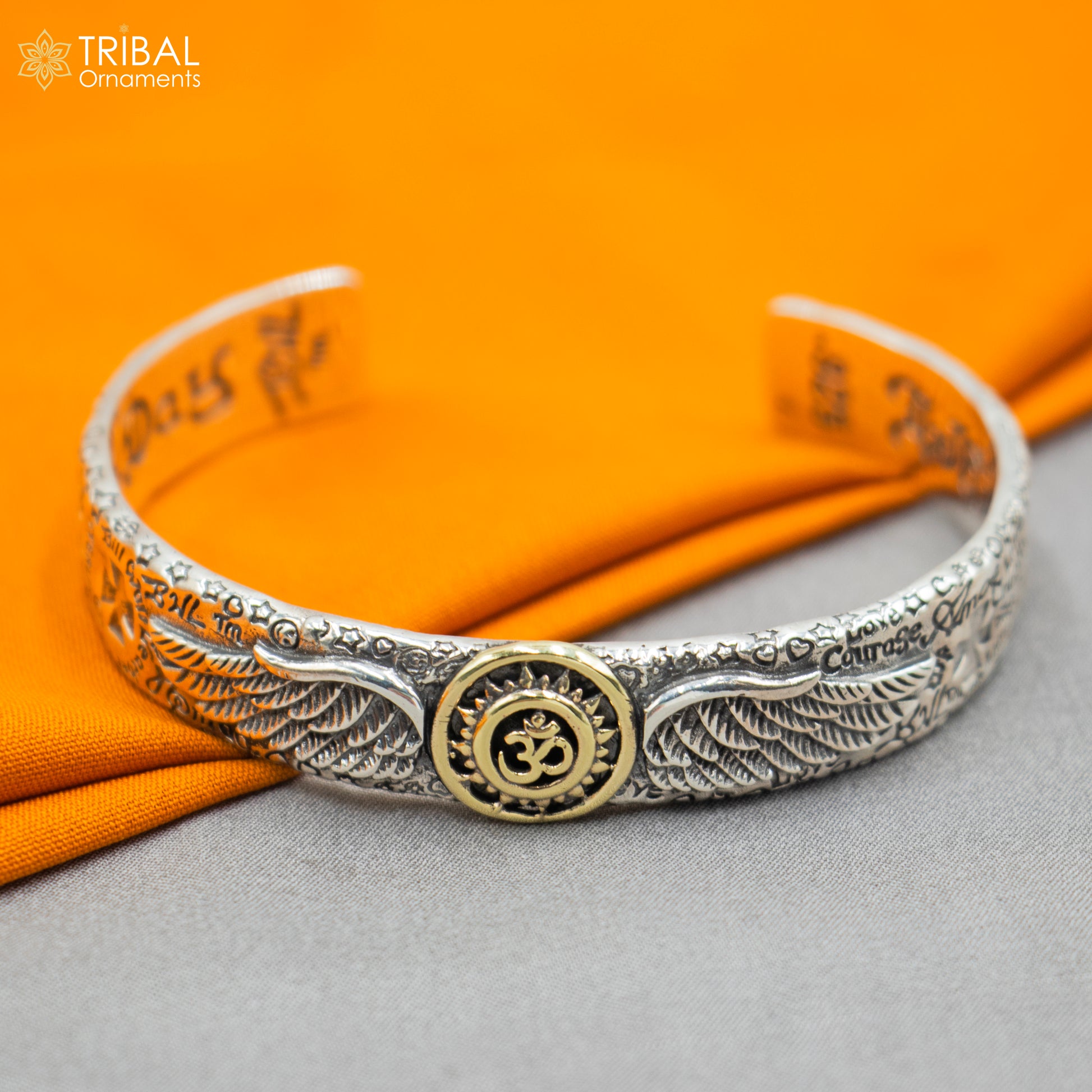 Sterling silver Lord Shiva mantra Om design adjustable bangle cuff bracelet with intricate unisex jewelry craftsmanship.