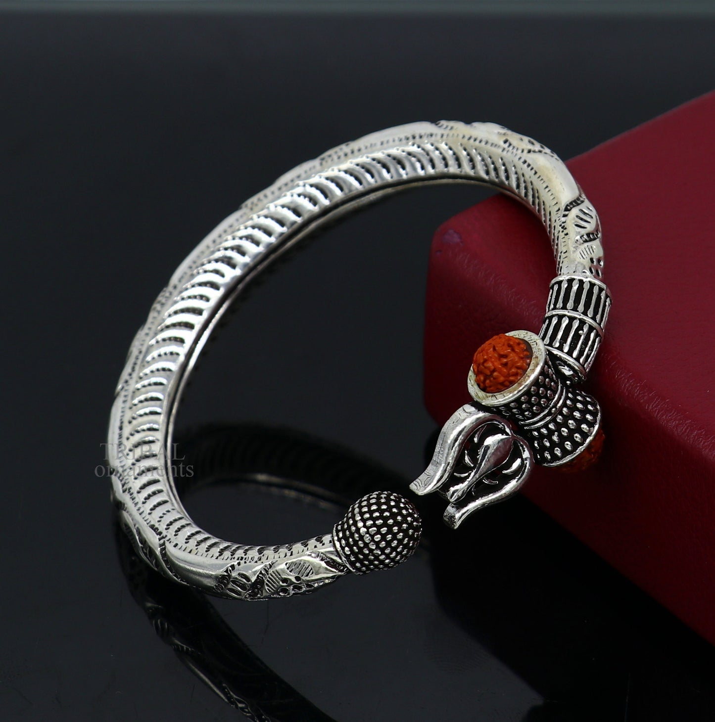 Sterling silver Lord Shiva trident bracelet with Rudraksha beads, handcrafted Bahubali Kada with customizable details.