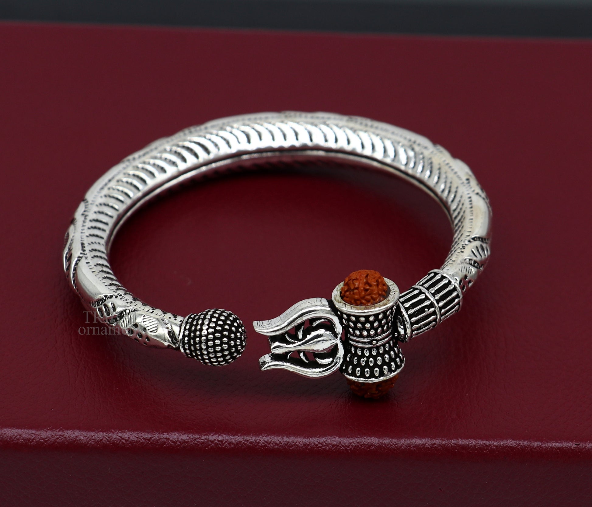 Sterling silver Lord Shiva trident bracelet with Rudraksha beads, handmade tribal ornament, Mahadeva-inspired jewelry.