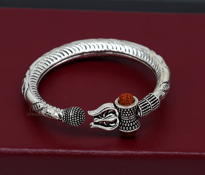 Sterling silver Lord Shiva trident bracelet with Rudraksha beads, handmade tribal ornament, Mahadeva-inspired jewelry.