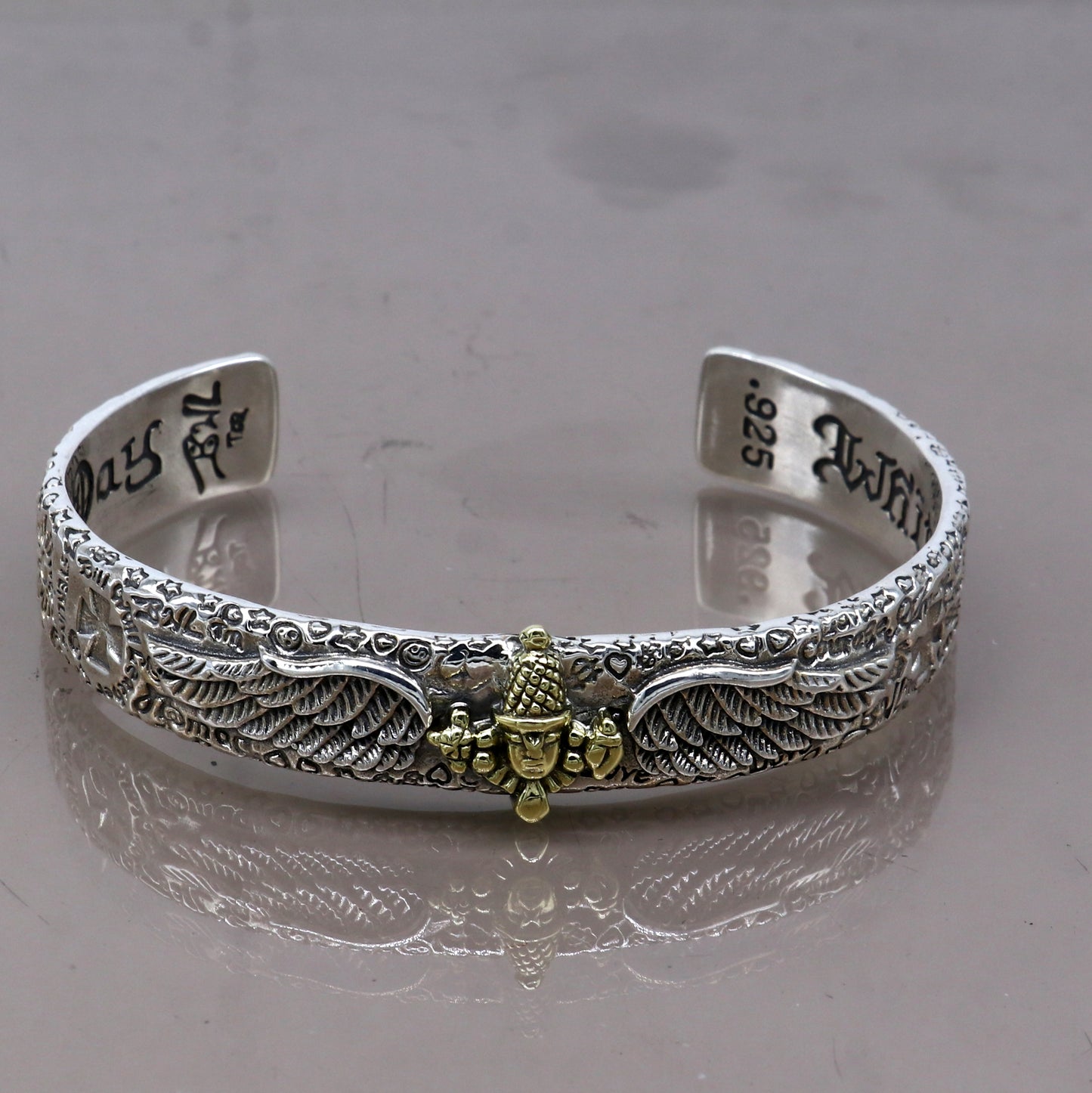 Sterling silver Lord Venkateshwara Tirupati Balaji adjustable unisex bracelet cuff by Tribal Ornaments with intricate design.