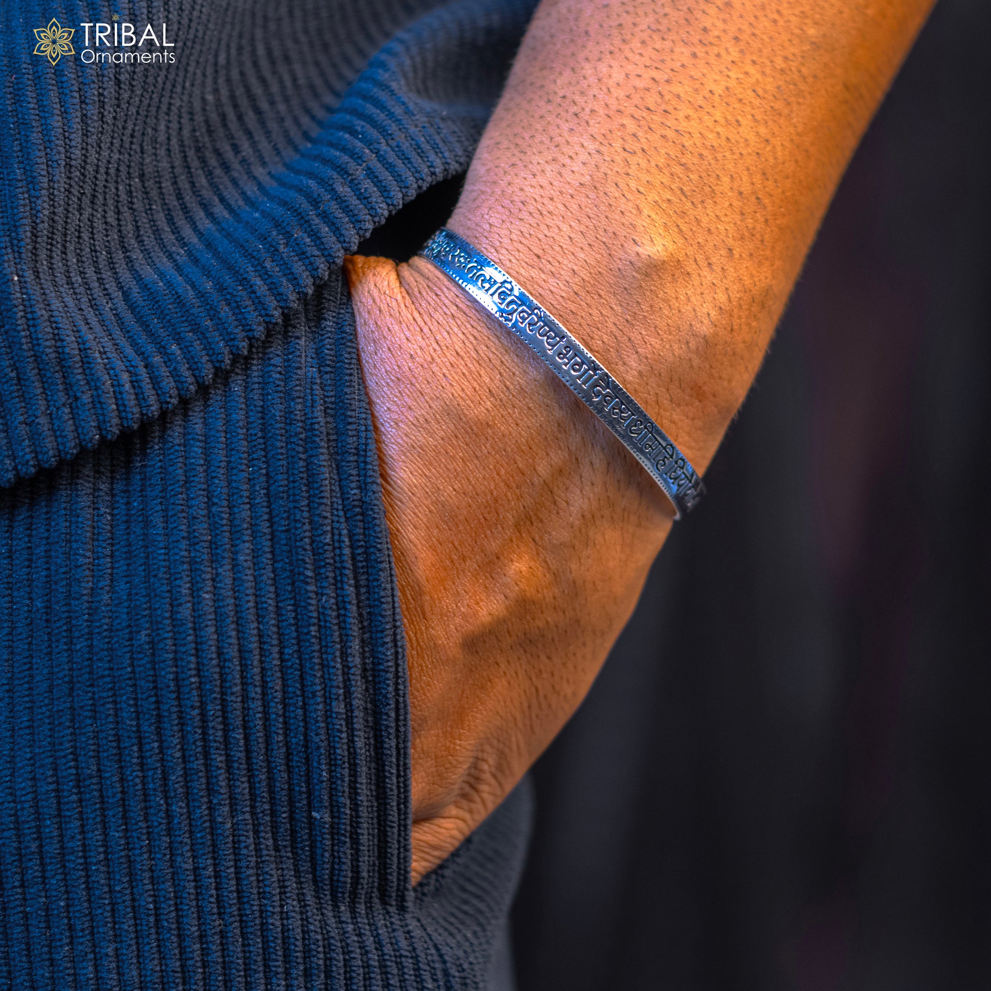Sterling silver Gayatri Mantra cuff bracelet by TRIBAL ORNAMENTS, unisex handmade jewelry with intricate mantra design.