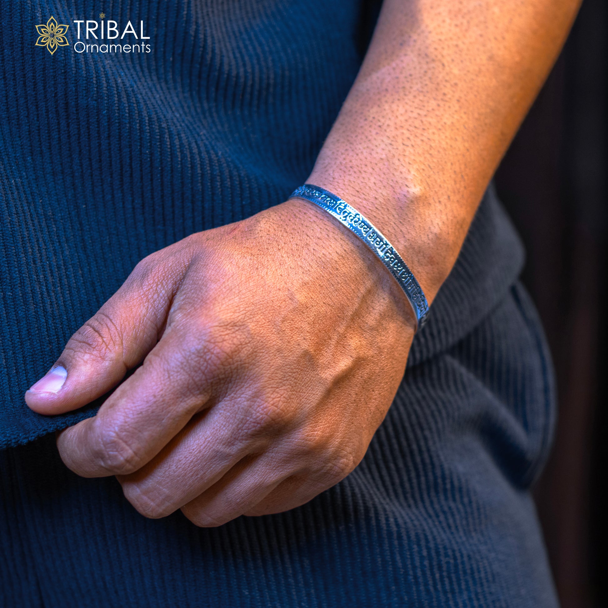 Sterling silver Gayatri Mantra cuff bracelet by TRIBAL ORNAMENTS, unisex handmade jewelry with engraved mantra design.