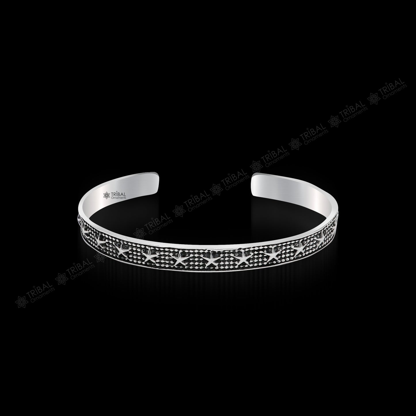 925 sterling silver open face cuff bracelet by Tribal Ornaments, handmade adjustable bangle with tribal design for gifting or everyday wear.