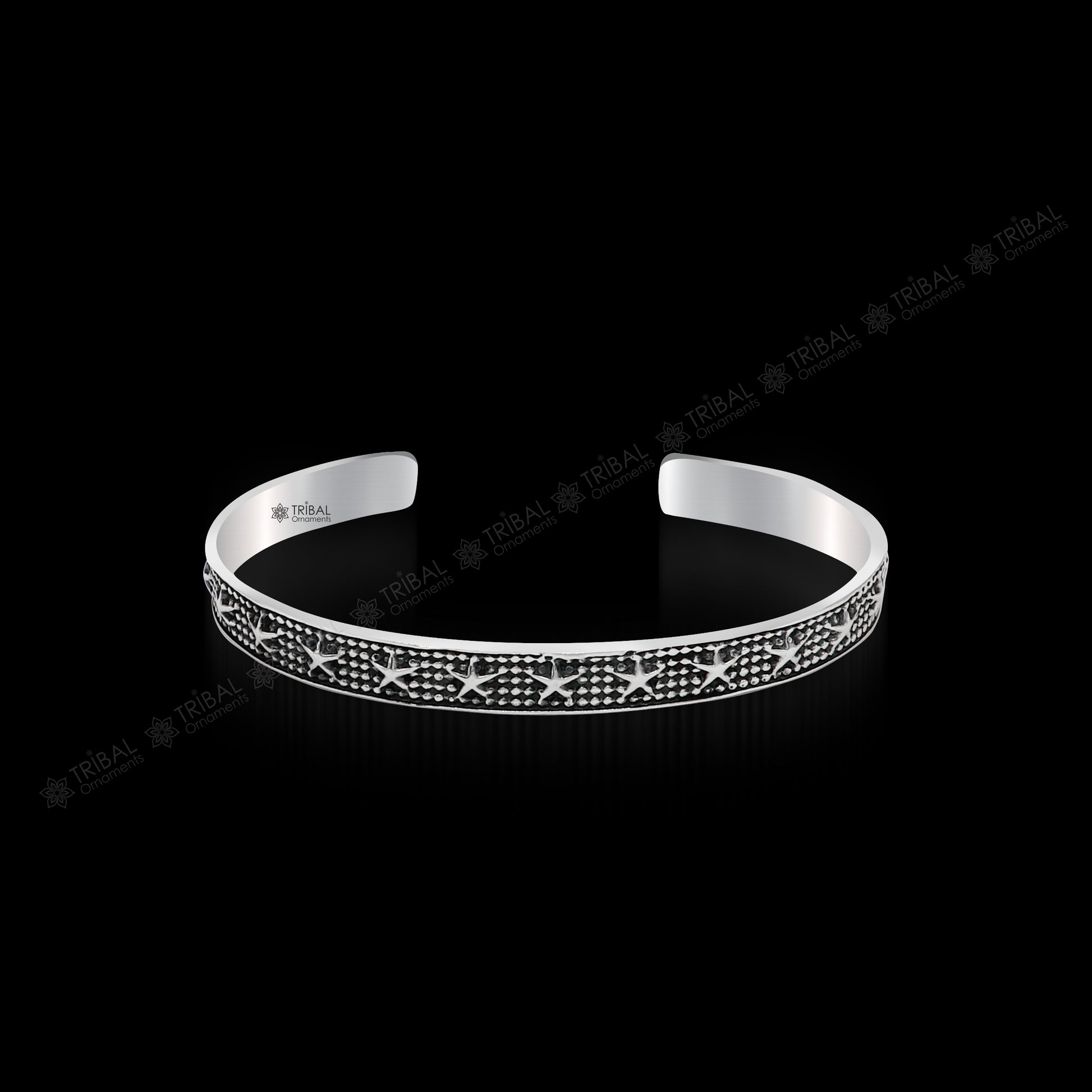 925 sterling silver open face cuff bracelet by Tribal Ornaments, handmade adjustable bangle with tribal design for gifting or everyday wear.