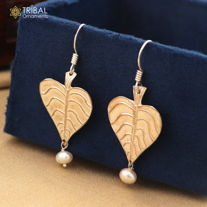 Sterling silver handmade peepal tree leaf earring with hanging pearl, customized hoop design from Tribal Ornaments summer collection.