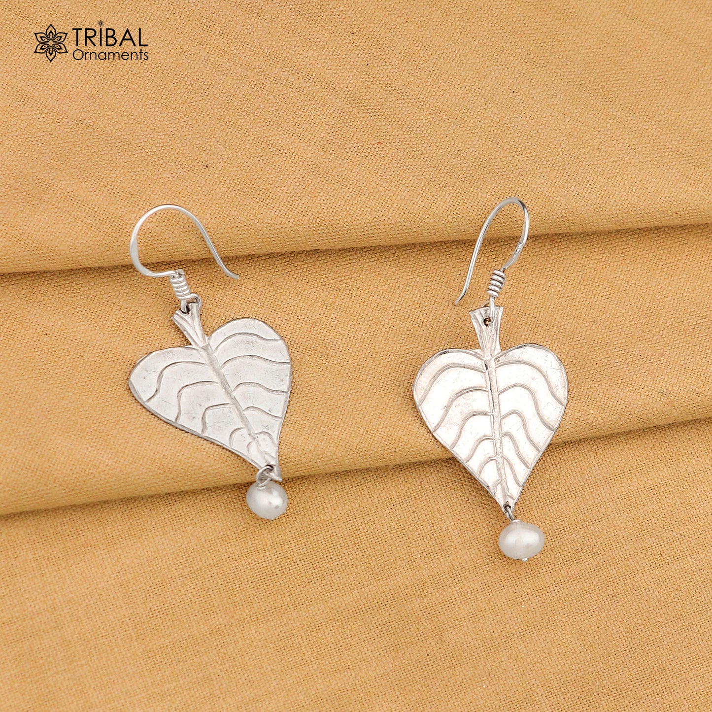 925 sterling silver handmade peepal tree leaf earring with hanging pearl, custom hoop design from TRIBAL ORNAMENTS summer collection.