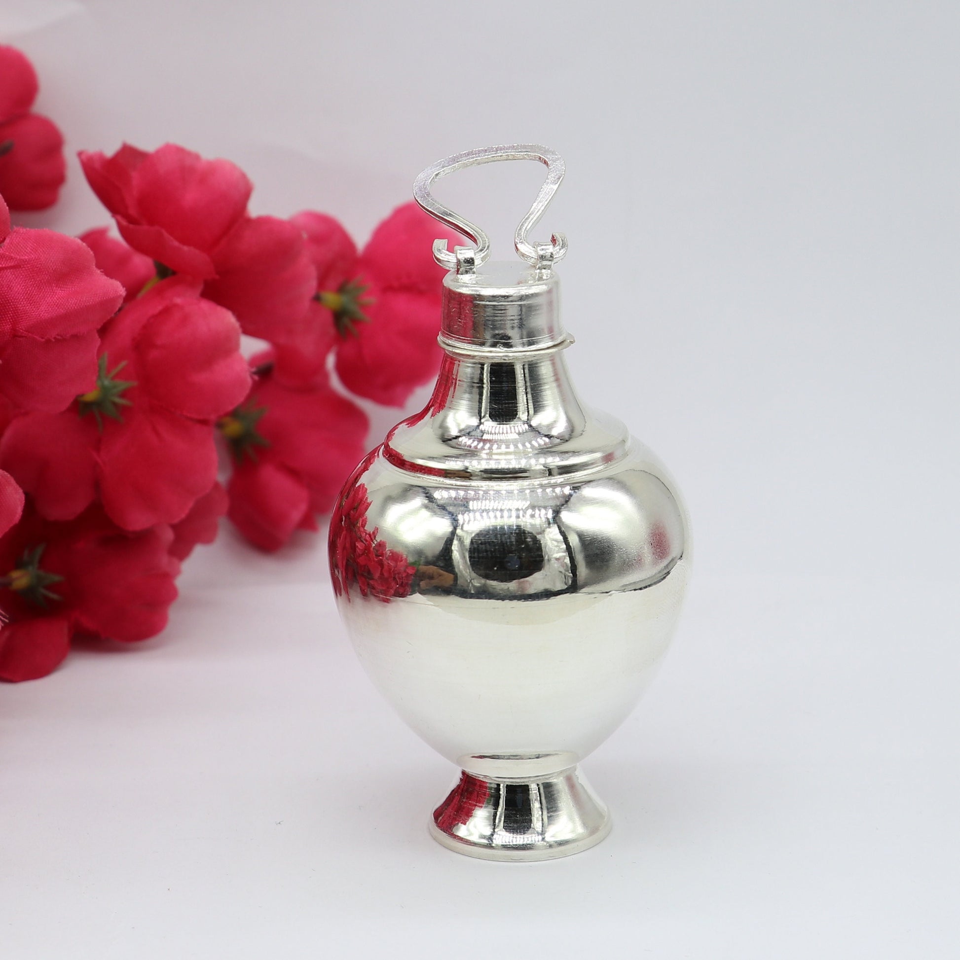 Sterling silver handmade Gangjali water pot with plain design, ideal for puja rituals, crafted by TRIBAL ORNAMENTS.