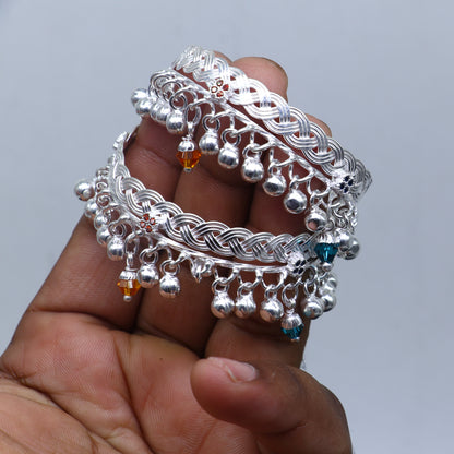 Sterling silver handmade baby anklet by Tribal Ornaments, unisex, delicate foot bracelet for kids with intricate silver design.