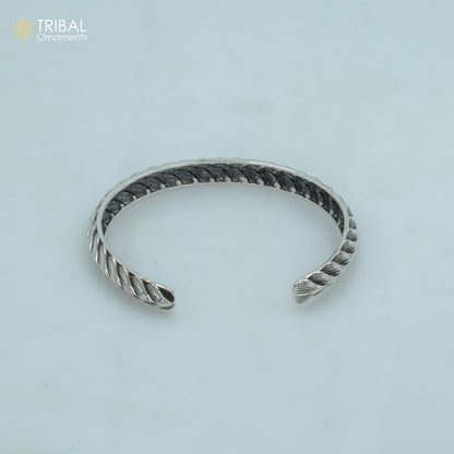 Sterling silver handmade adjustable unisex bangle bracelet with stylish tribal design and cuff style jewelry from TRIBAL ORNAMENTS.