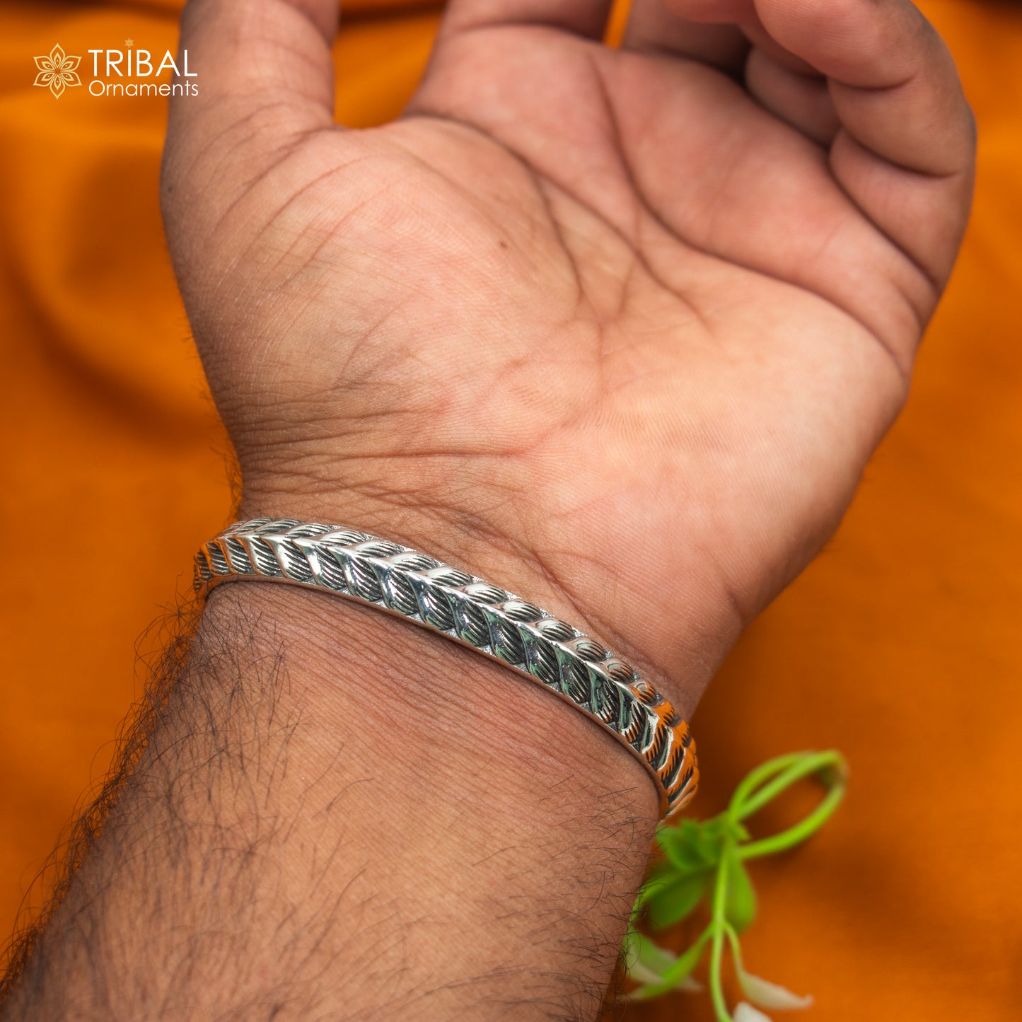 Sterling silver handmade adjustable bangle bracelet by Tribal Ornaments, stylish unisex jewelry cuff with intricate design.
