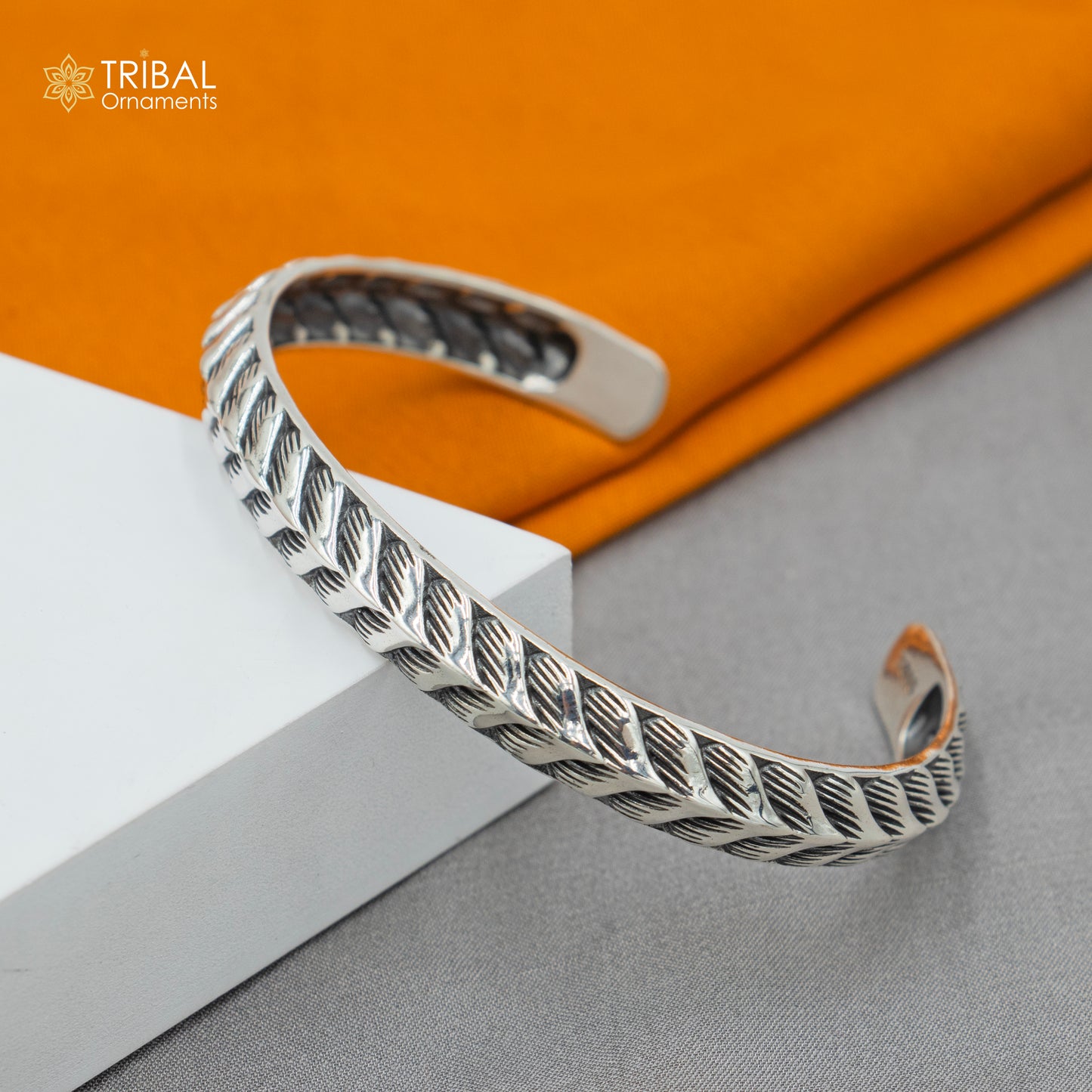 Sterling silver handmade adjustable bangle bracelet by TRIBAL ORNAMENTS, unisex jewelry cuff with stylish design.