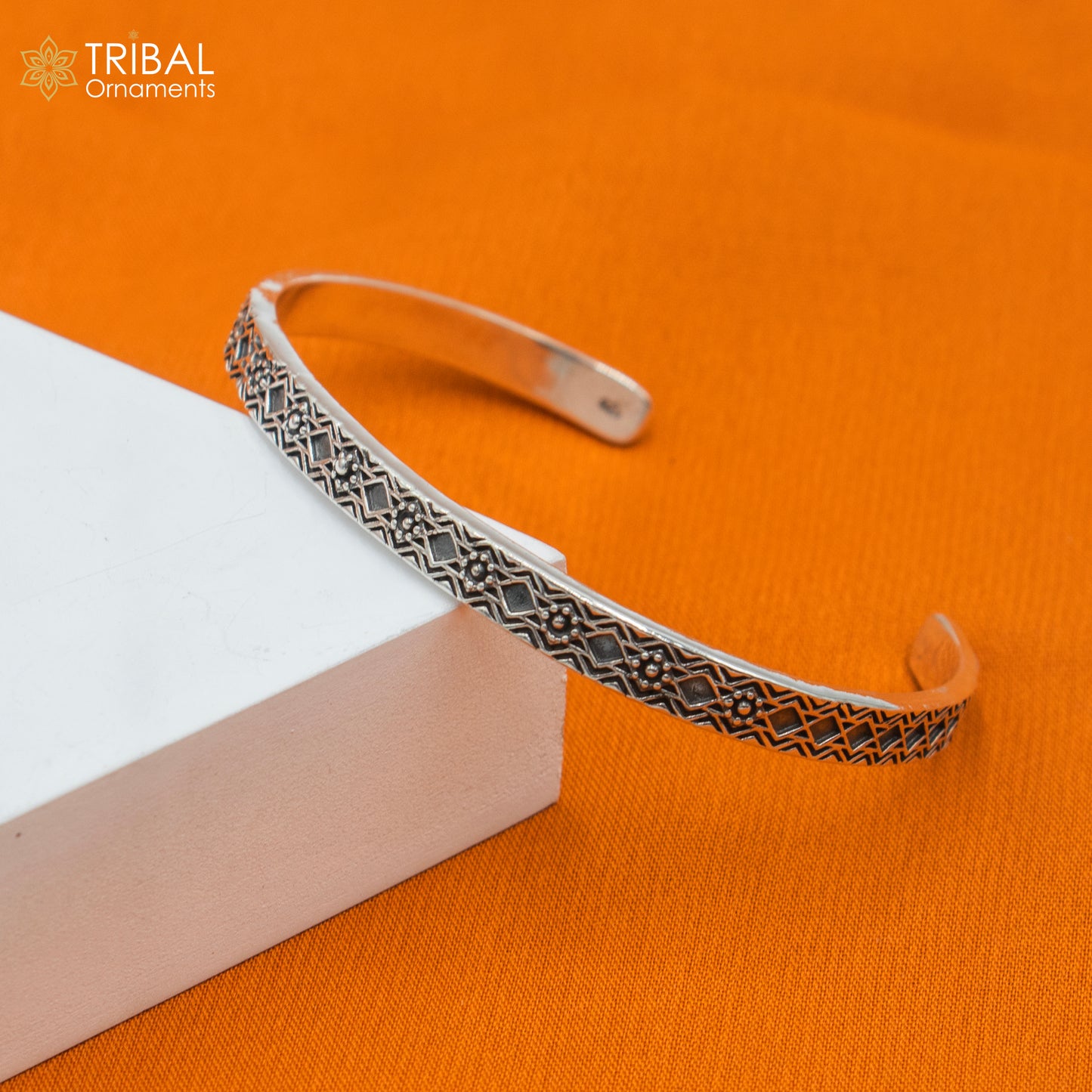 Sterling silver adjustable bangle cuff bracelet by TRIBAL ORNAMENTS, unisex stylish jewelry with intricate design and handcrafted details.