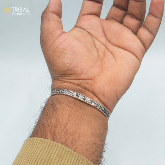 Sterling silver adjustable bangle cuff bracelet by Tribal Ornaments, unisex handmade jewelry with stylish design.
