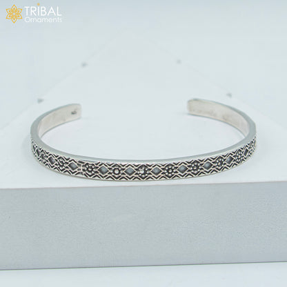 Sterling silver adjustable bangle cuff bracelet by TRIBAL ORNAMENTS, unisex handmade jewelry with stylish design.